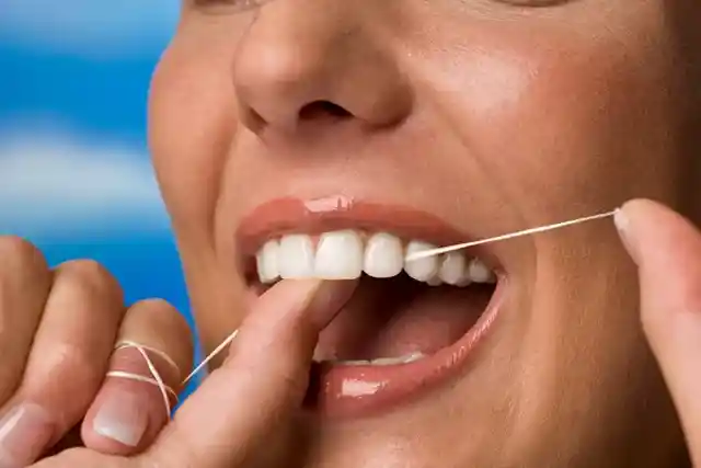 Flossing incorrectly