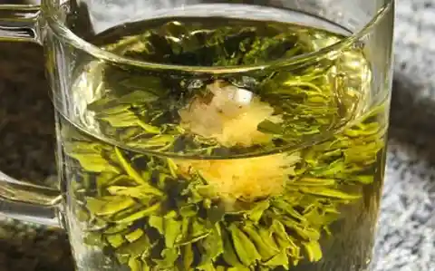Drinking chrysanthemum tea for its anti-inflammatory benefits